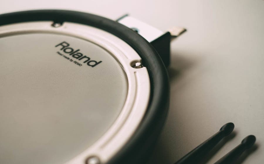 Electronic drum pads set up on a rack